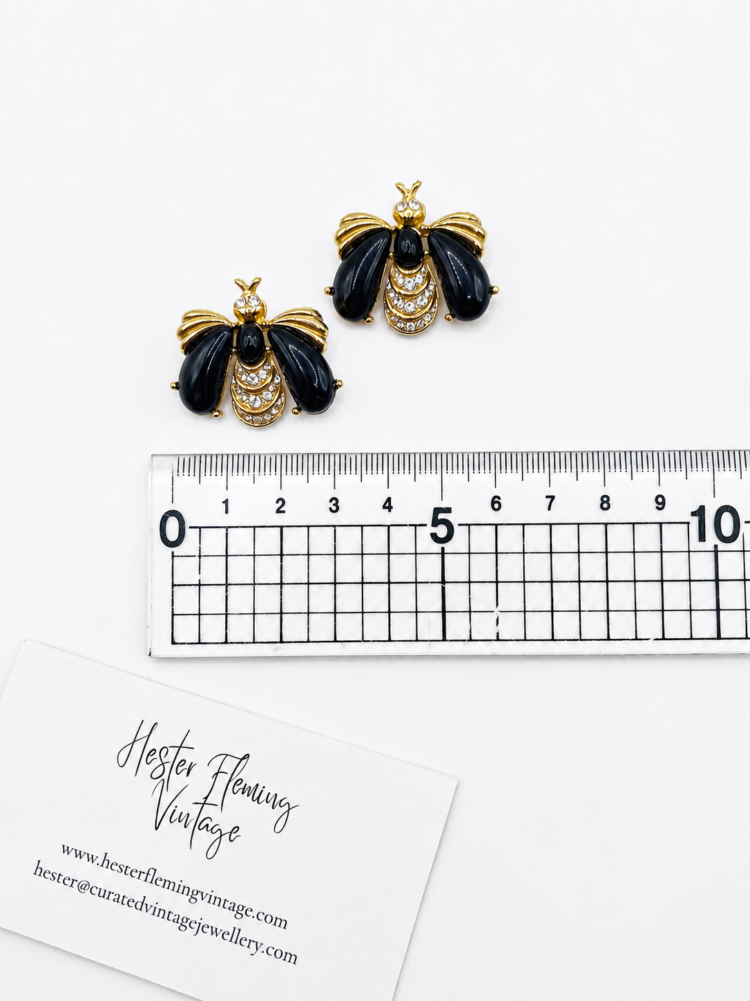 Vintage 1990s Givenchy Bee Brooch Set - placed next to a ruler for measurement. 