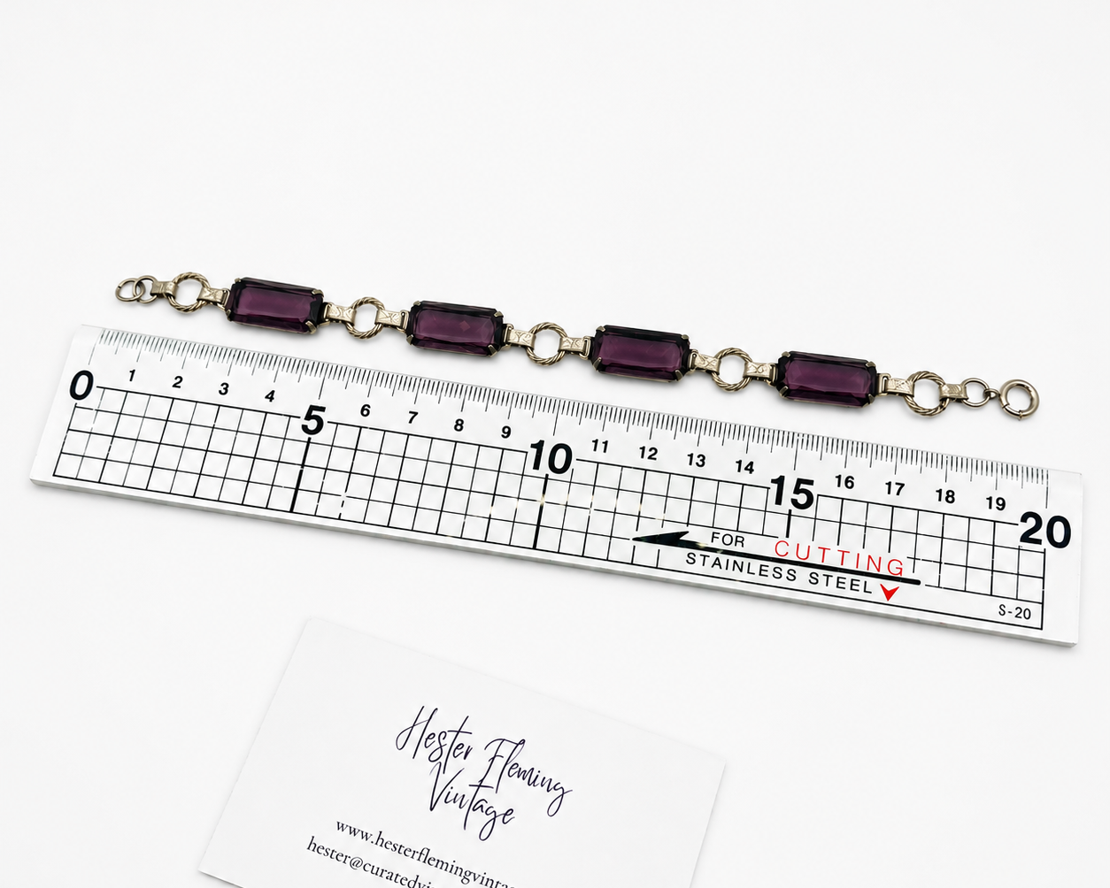 Art Deco Bracelet, placed next to a ruler for size. 