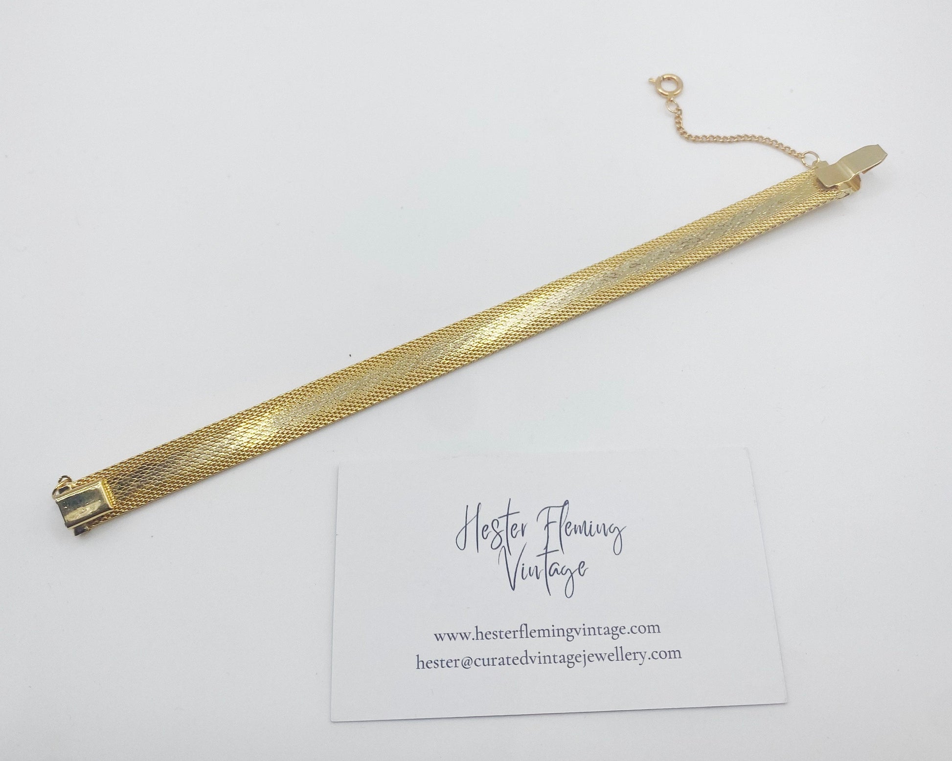 Back view of Vintage 70s gold mesh bracelet. Safety chain included. 