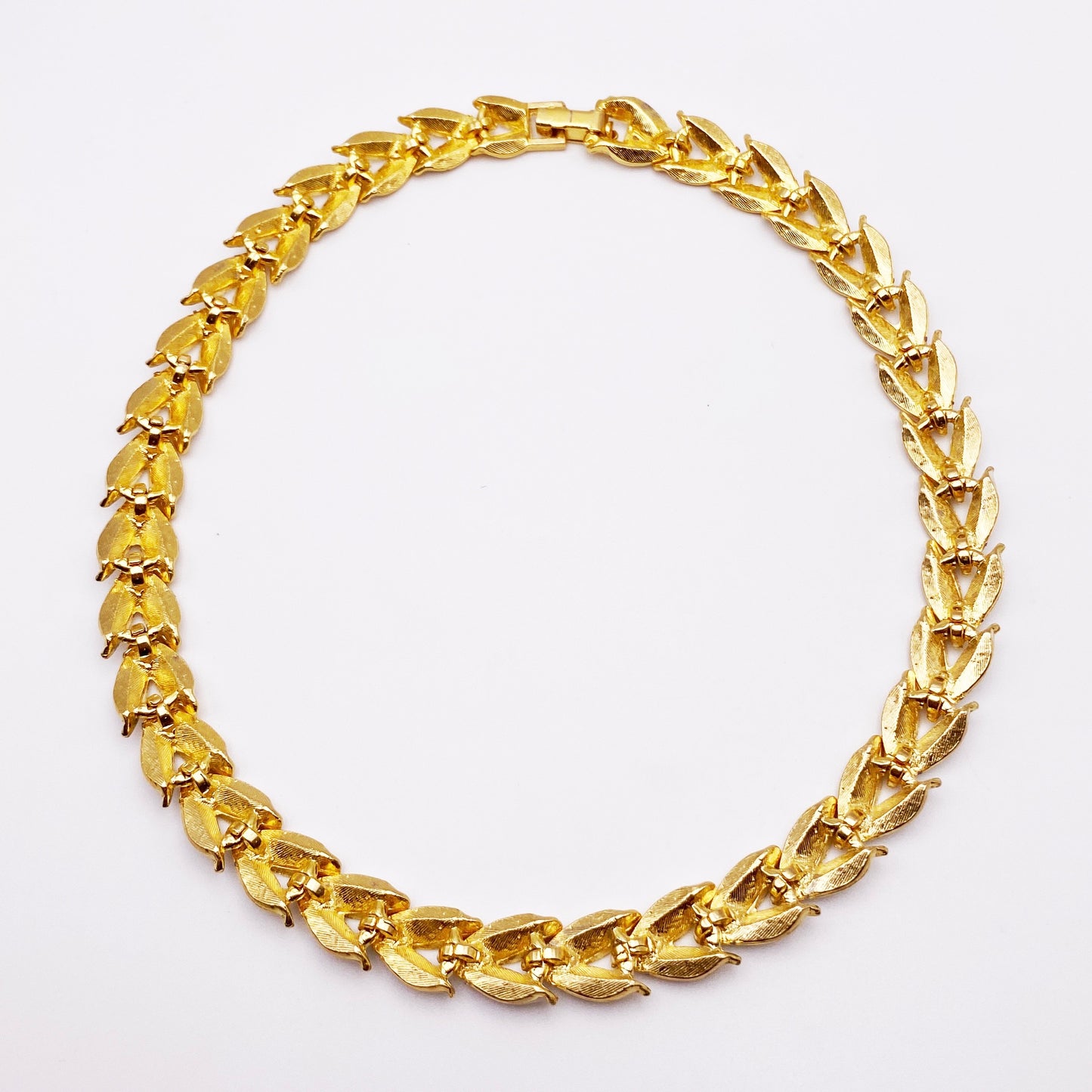 Back view of 1980s Enamel Leaf Necklace on White Background.