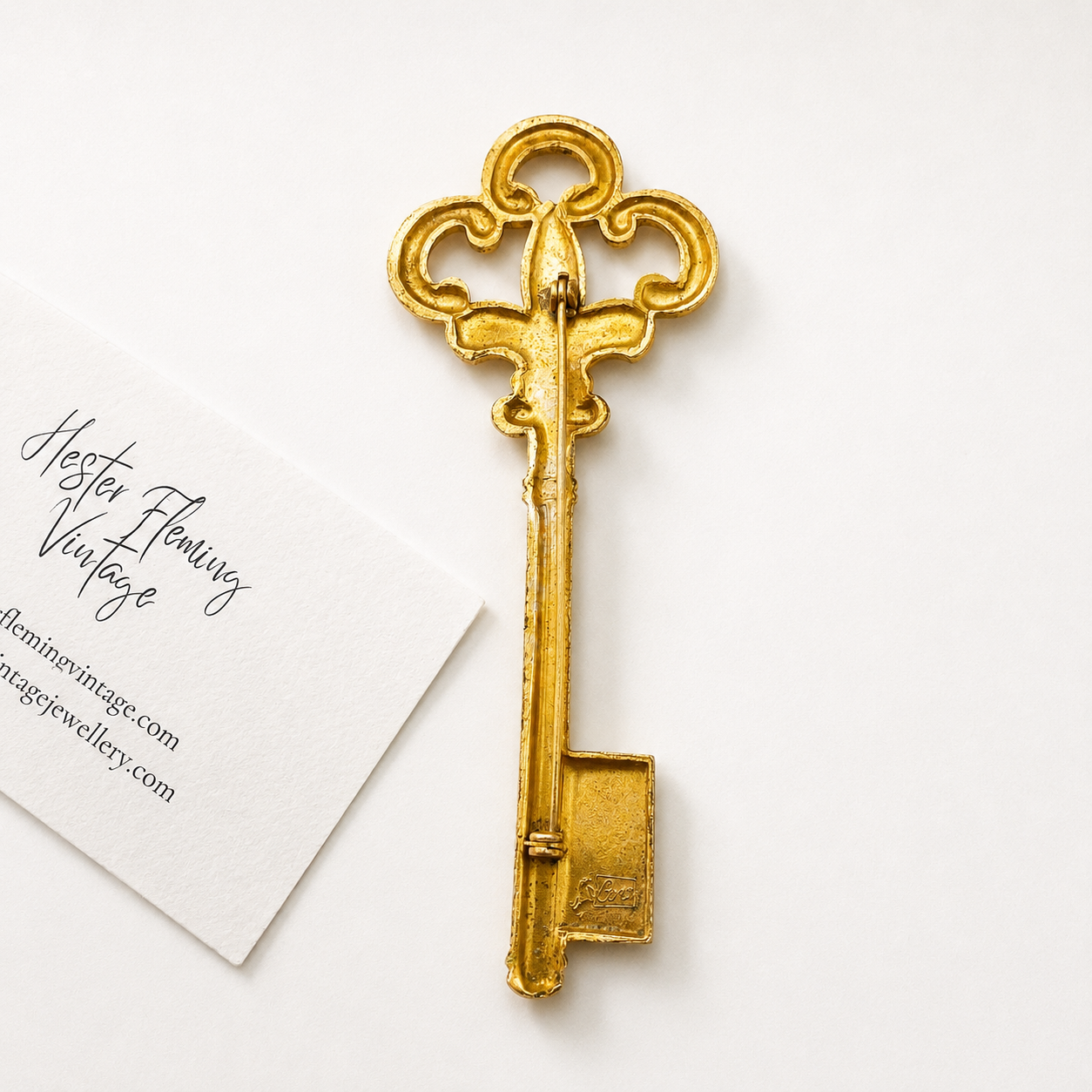 Back view, signed Coro. Gilt finish.  Roll clasp.