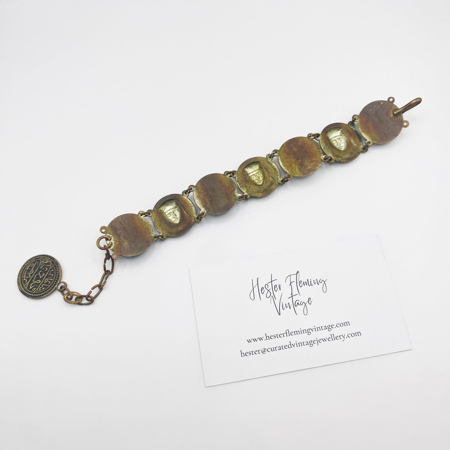 Detailed back view of antique deco brass Egyptian revival bracelet from the 1920s/30s