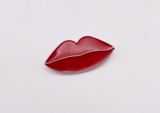 Circa, 2000s. Red enamel lapel pin by Dior. Highly collectable. Part of the Ultra Love N851 lipstick launch.