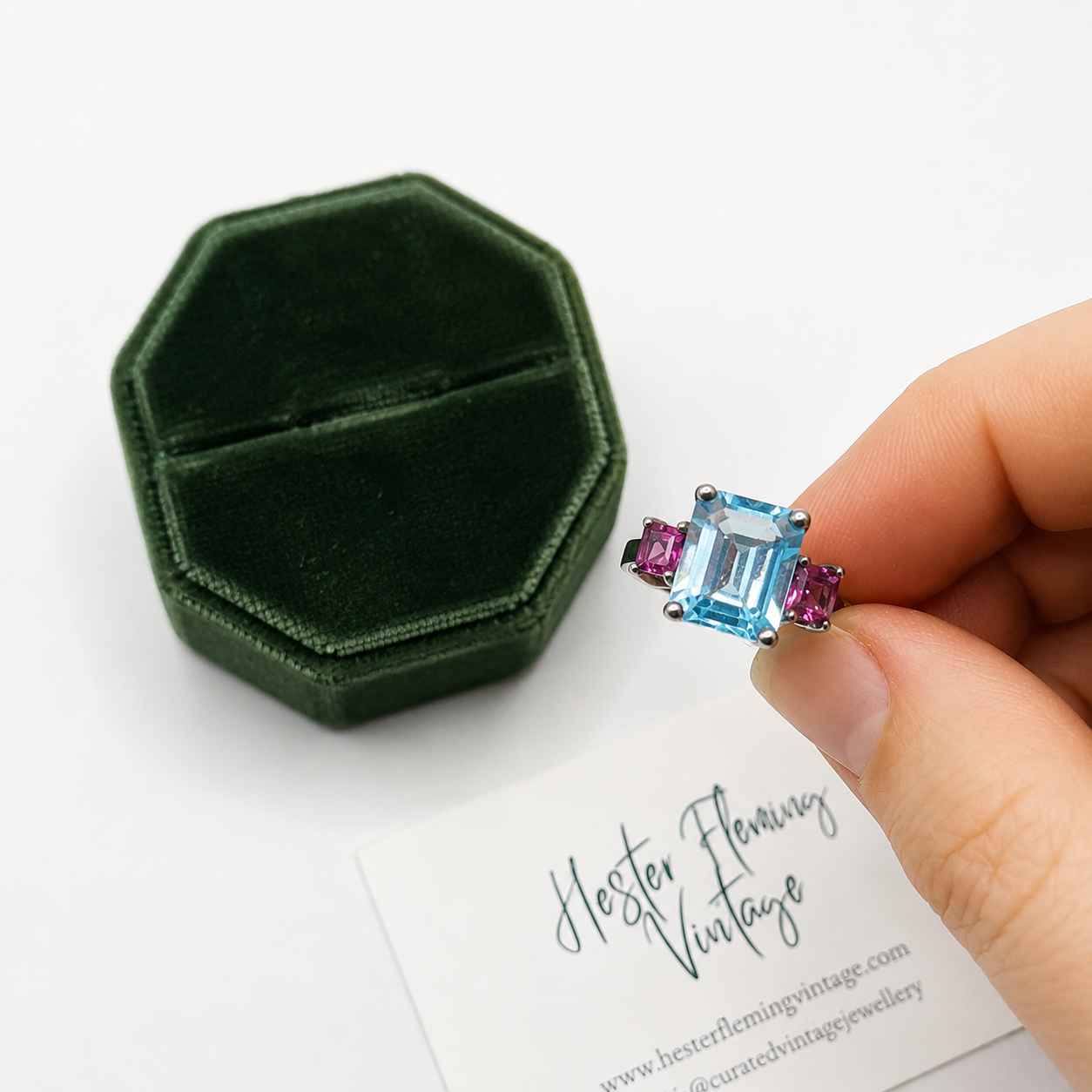 Late 90s Aquamarine Ring, held by fingers. Size K