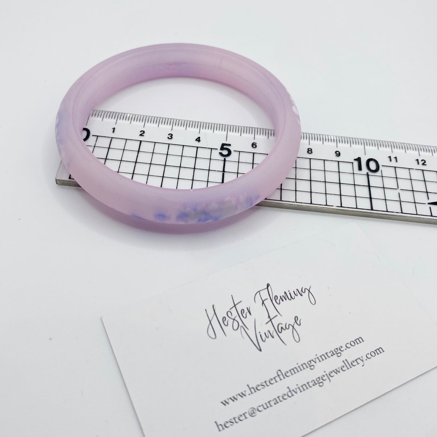 6.75cm diameter measurement of vintage 80s pink polymer bangle.