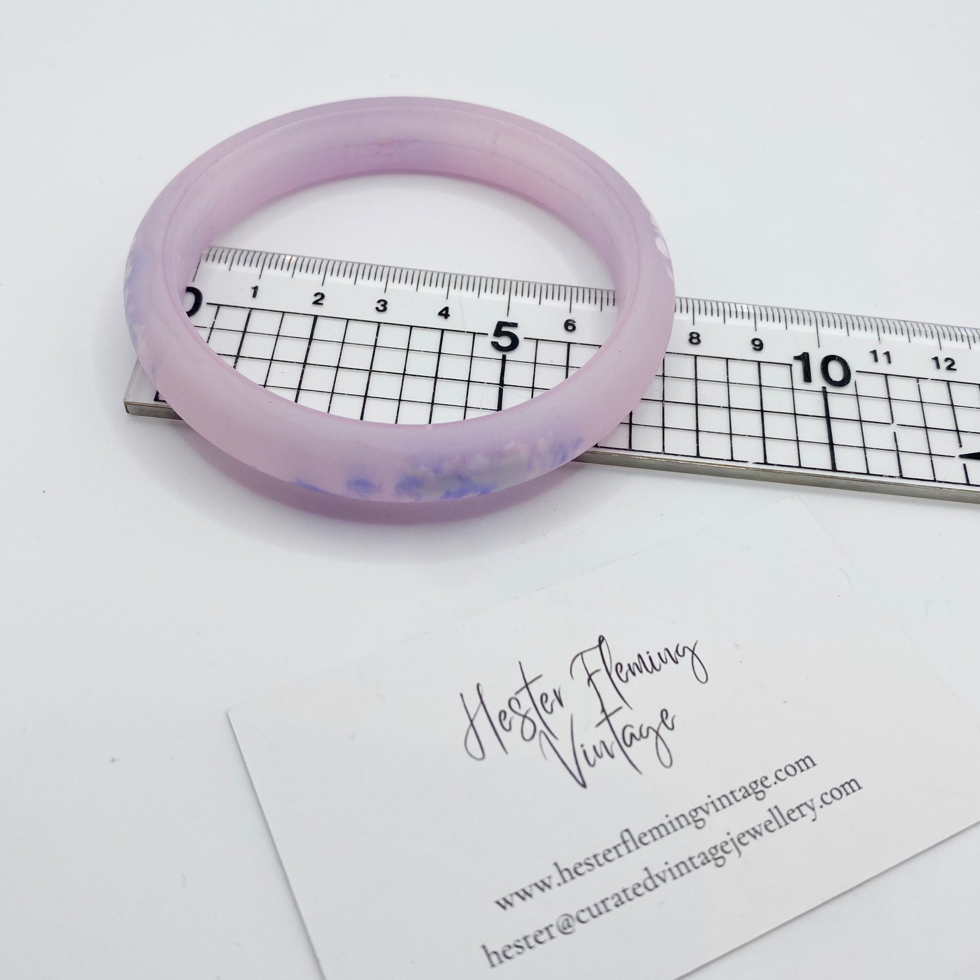 6.75cm diameter measurement of vintage 80s pink polymer bangle.