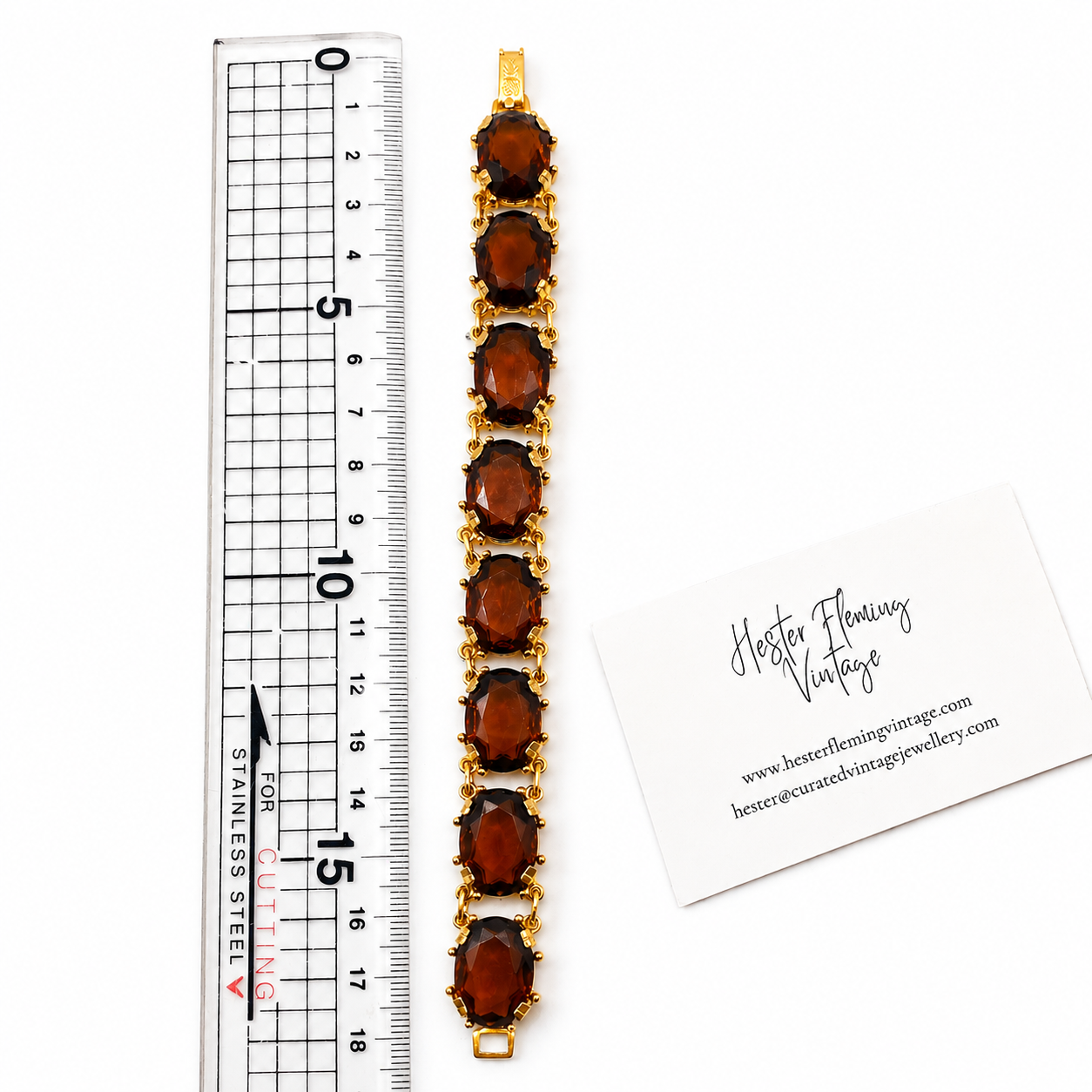 Vintage 90s Swarovski Crystal Amber Bracelet, displayed next to a ruler for measurement 