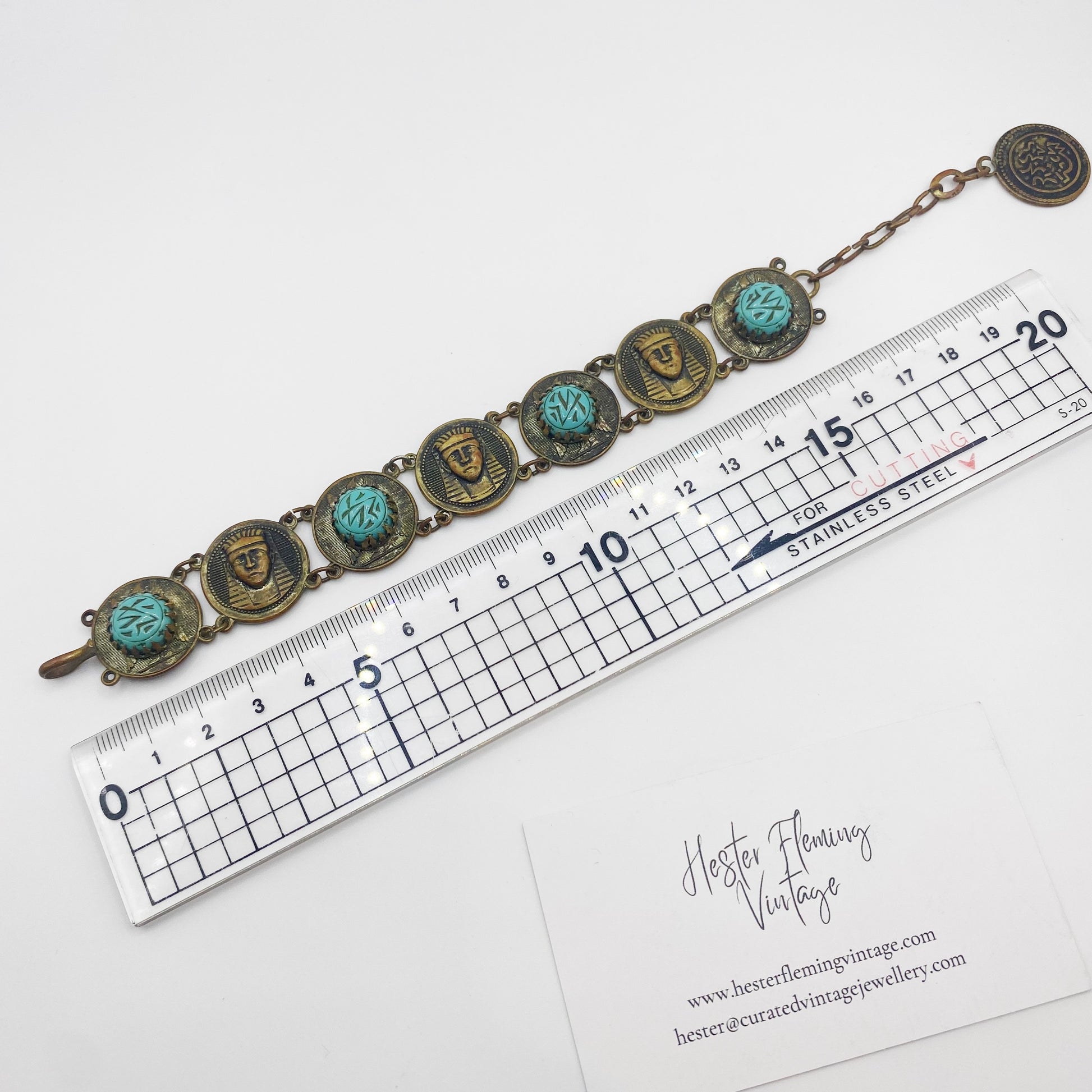 22cm (adjustable to smaller) measurement of antique Egyptian revival bracelet.
