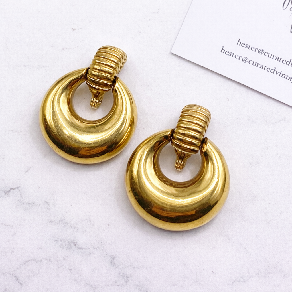 1970s vintage Monet doorknocker earrings. 