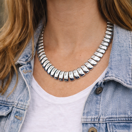Casual model wearing 1970s Napier Silvertone Collar