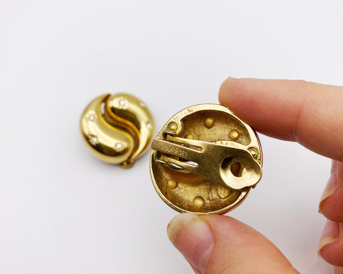 Signature of Courreges Earrings, dating from the 1980s. 