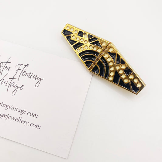 1980s French Nouveau Resin Brooch with black enamel detail.