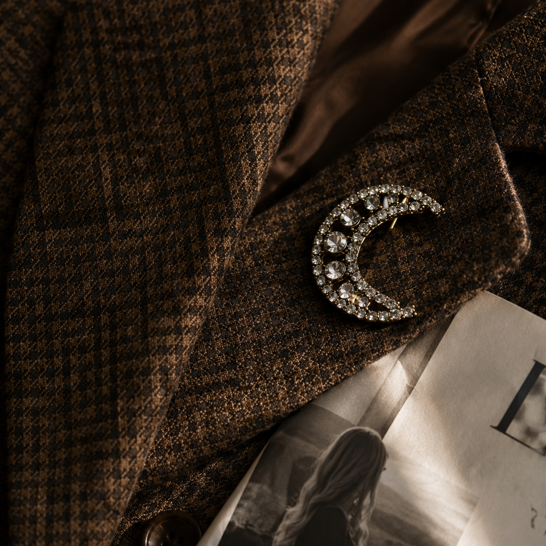 Vintage 90s Crescent Moon Brooch, styled on a retro jacket lapel. 