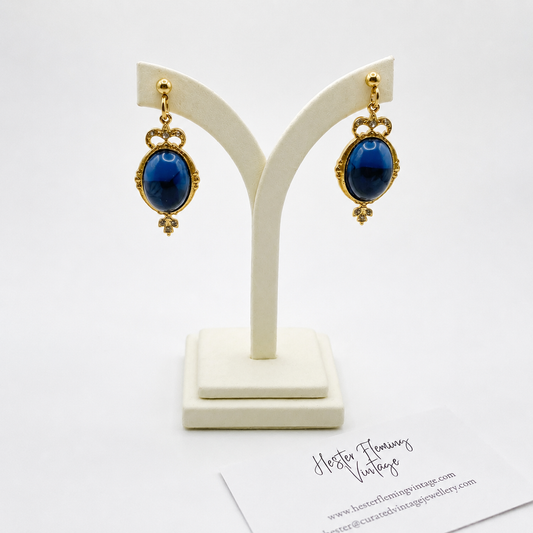 Vintage 90s Renaissance style earrings, on jewellery stand