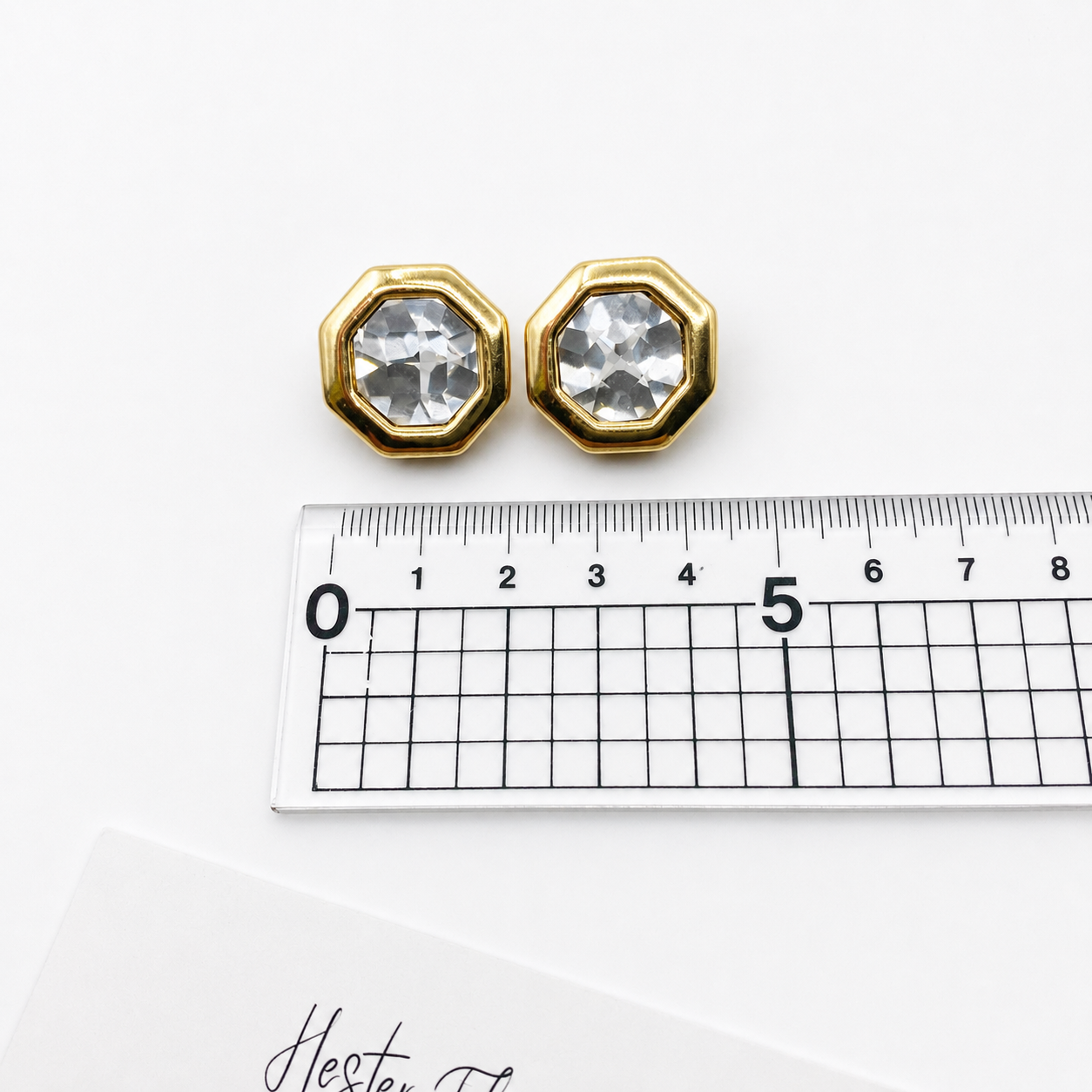Each earring measures 2.25 x 2.25cm.