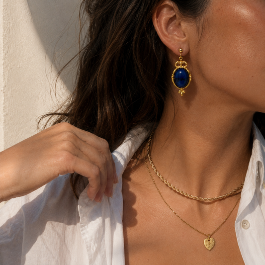 Vintage 90s renaissance earrings, styled on a contemporary model. 
