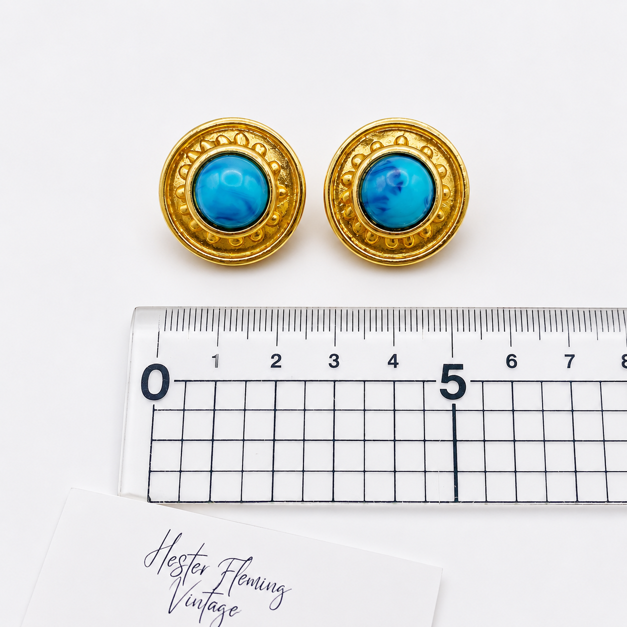 1980s Vintage Athena Earrings, placed next to a ruler for size. 2cm x 2cm. 
