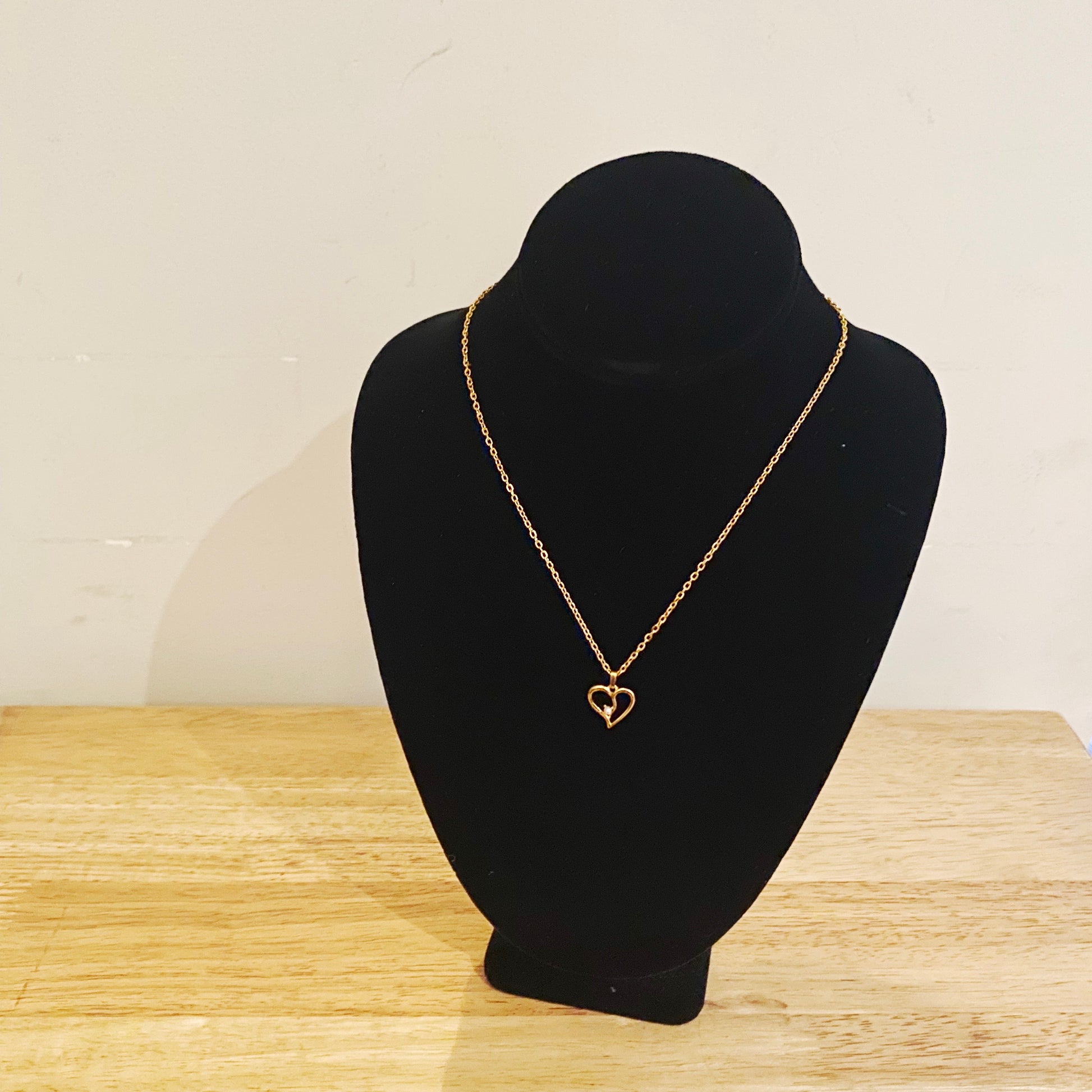Vintage 1990s heart charm necklace with faux pearl and gold plating