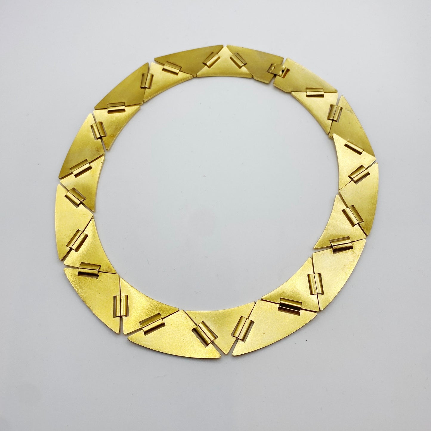 Back of retro 1980s statement necklace, vintage gold-plated fashion jewellery.