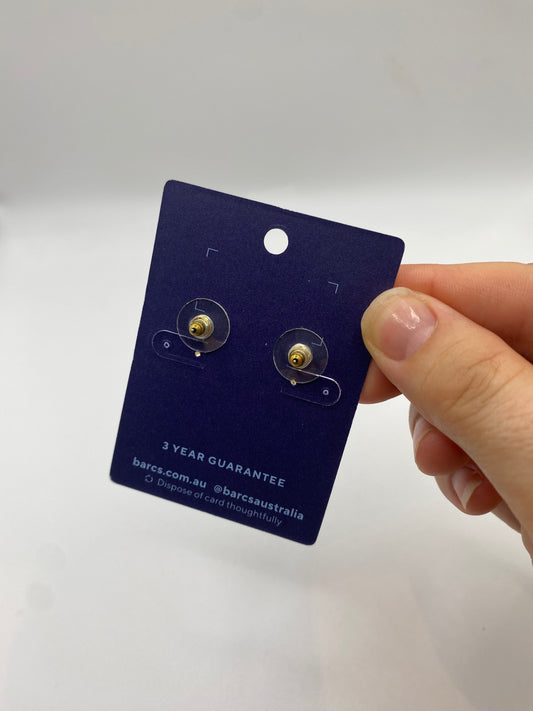 Back view of 1990s Barcs gold-plated hoop earrings designed for pierced ears