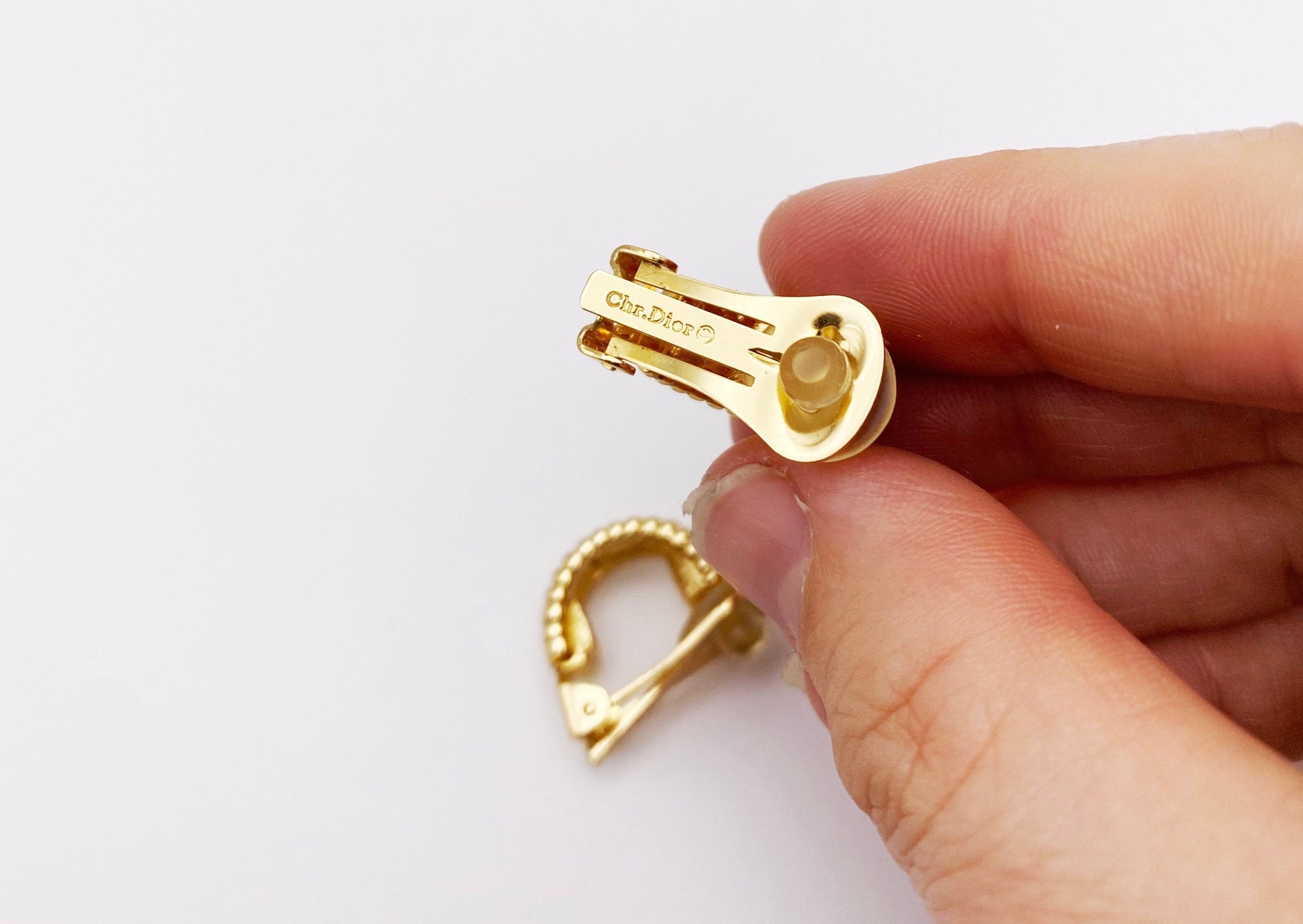Signature Chr. Dior stamp on vintage clip-on earrings