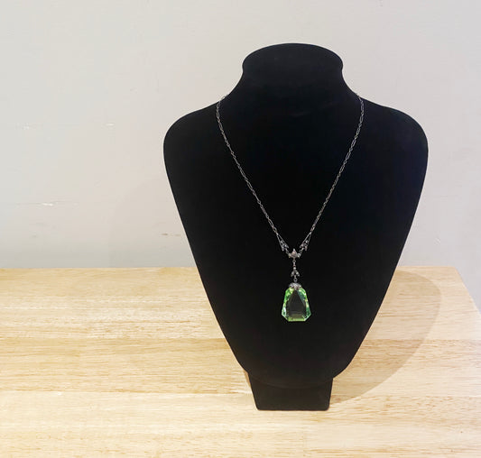 Front view of Czech Deco uranium glass pendant.