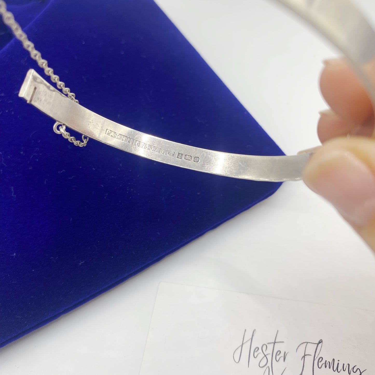 Interior of hallmarked Birmingham 925 sterling silver bangle showing Anchor, Lion passant and date letter U