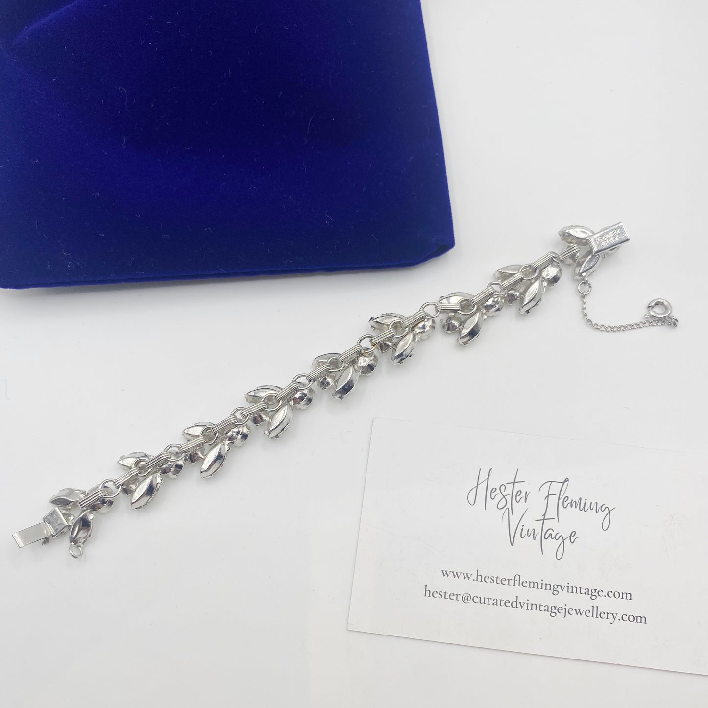Back of signed Kramer of NY bracelet showing clasp and safety chain.  