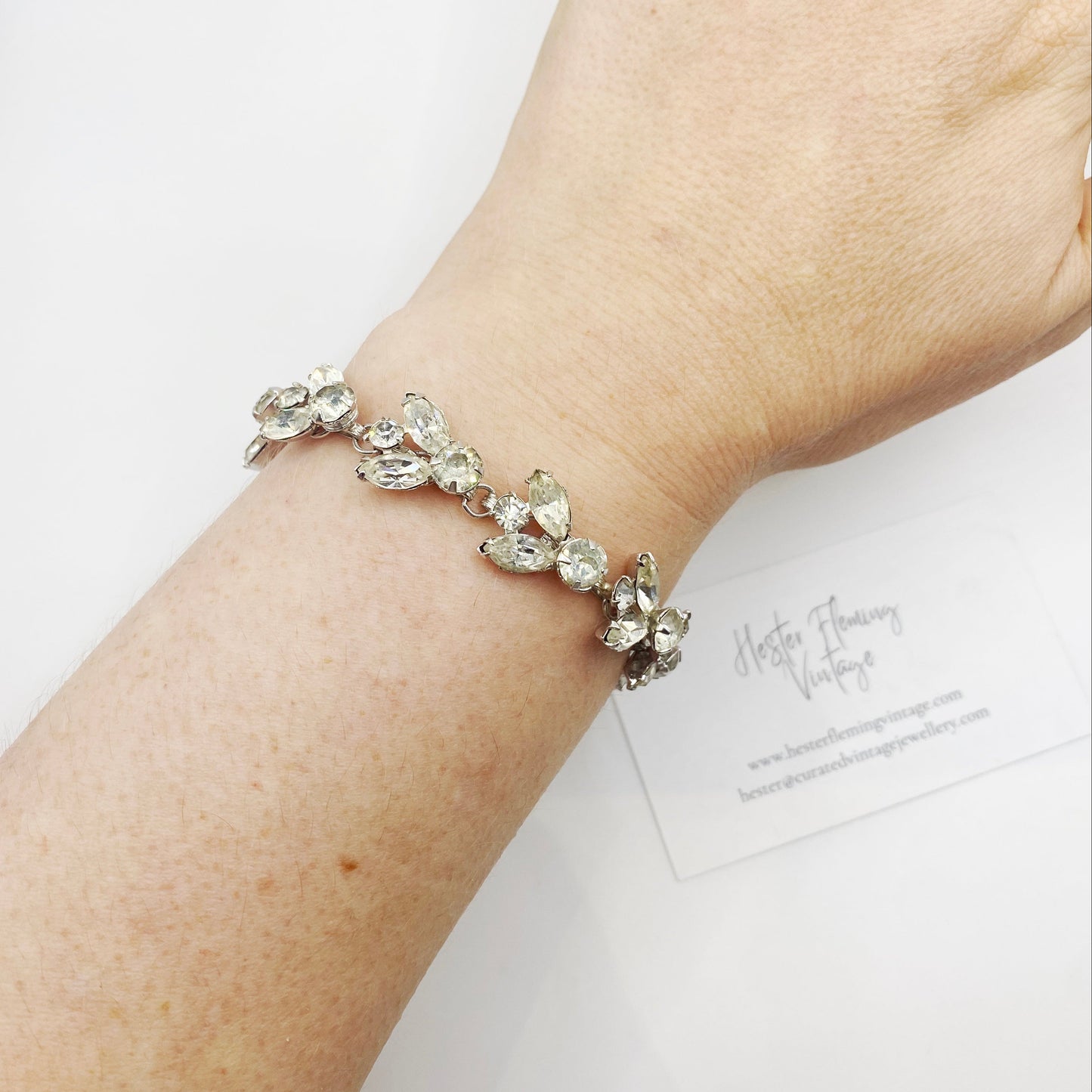 Vintage Kramer of NY crystal bracelet with marquise and round cut rhinestones in rhodium plated setting.  Pictured worn on wrist.