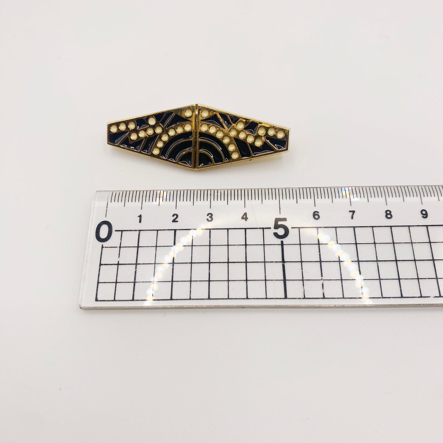 Measurement of black enamel French Nouveau brooch from the 1980s, unworn vintage jewellery piece.