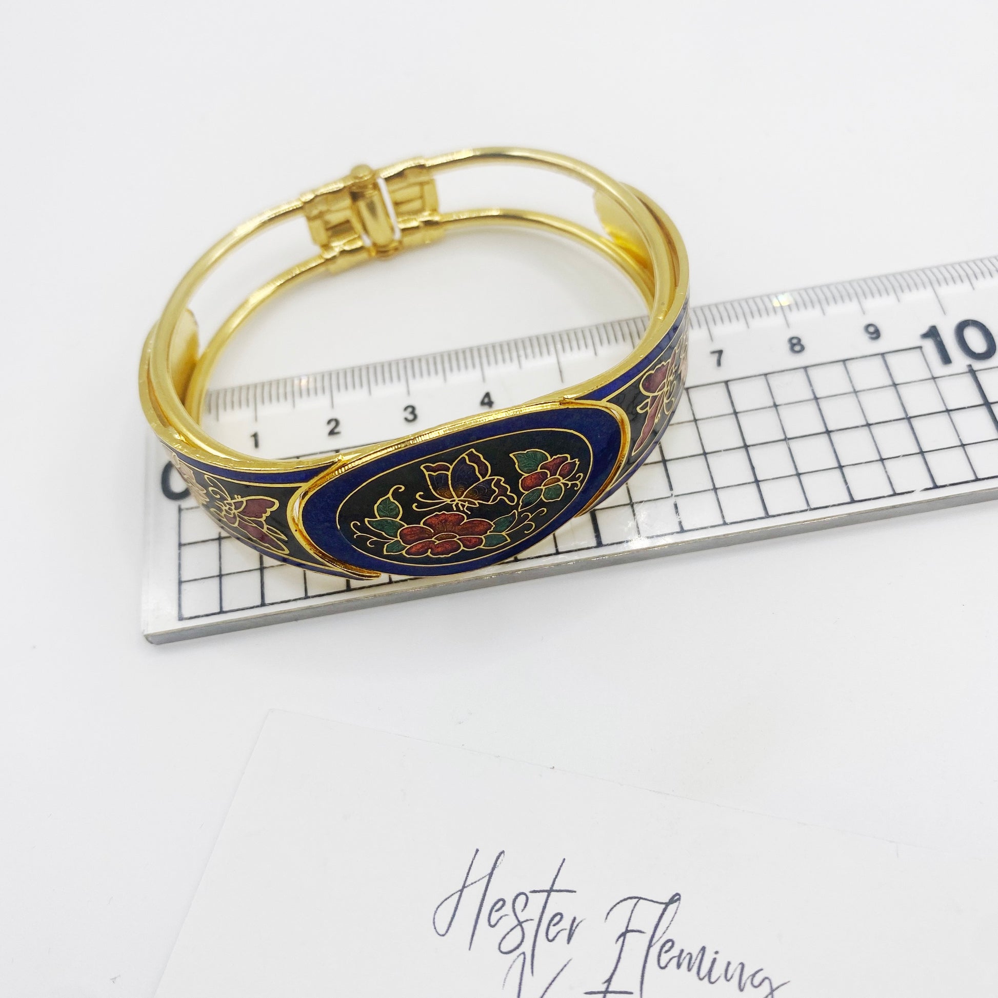 Measurement of hinged vintage enamel bangle, deadstock 1980s jewellery.