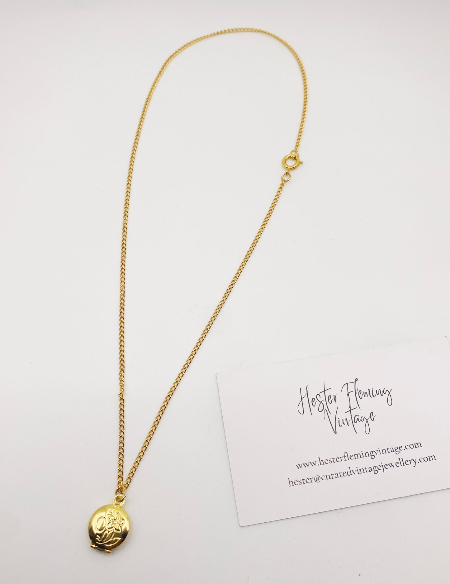 1990s gold locket charm necklace, ideal for vintage jewellery lovers.