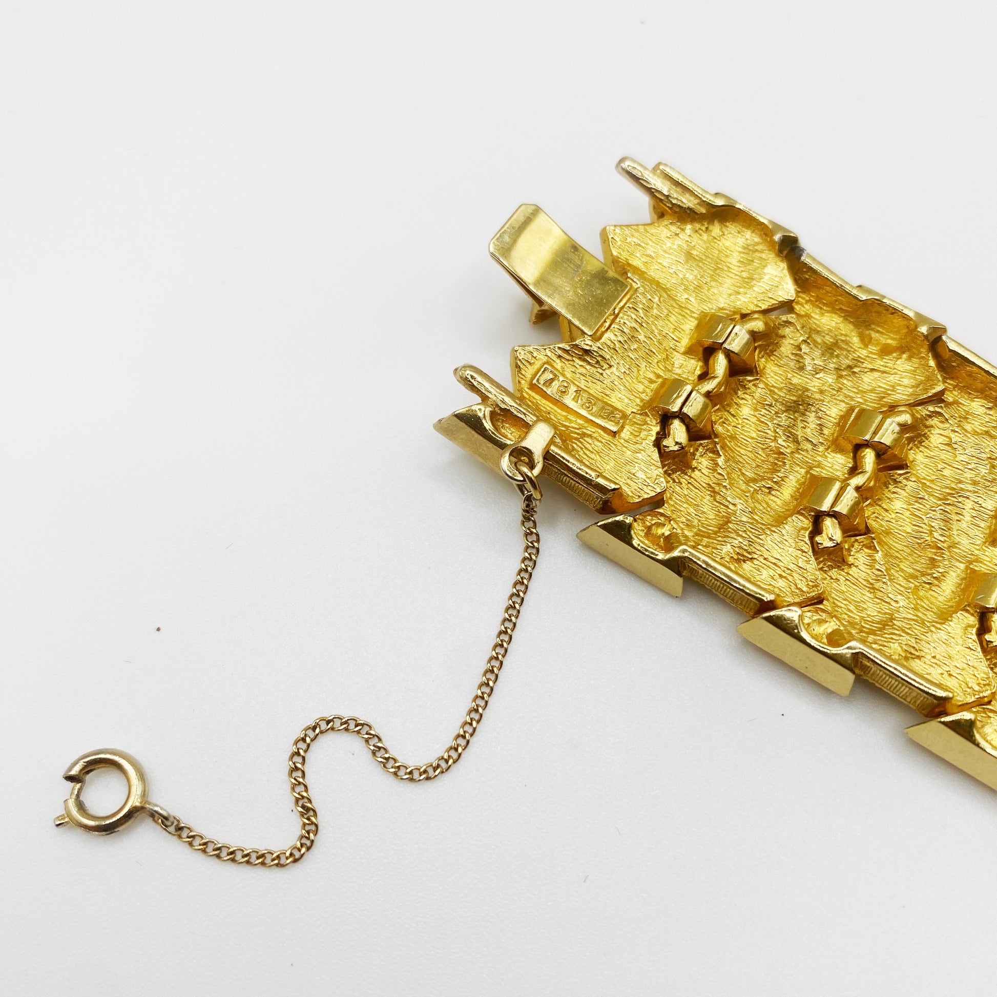 Back view showing signature 781382 on vintage French designer bracelet
