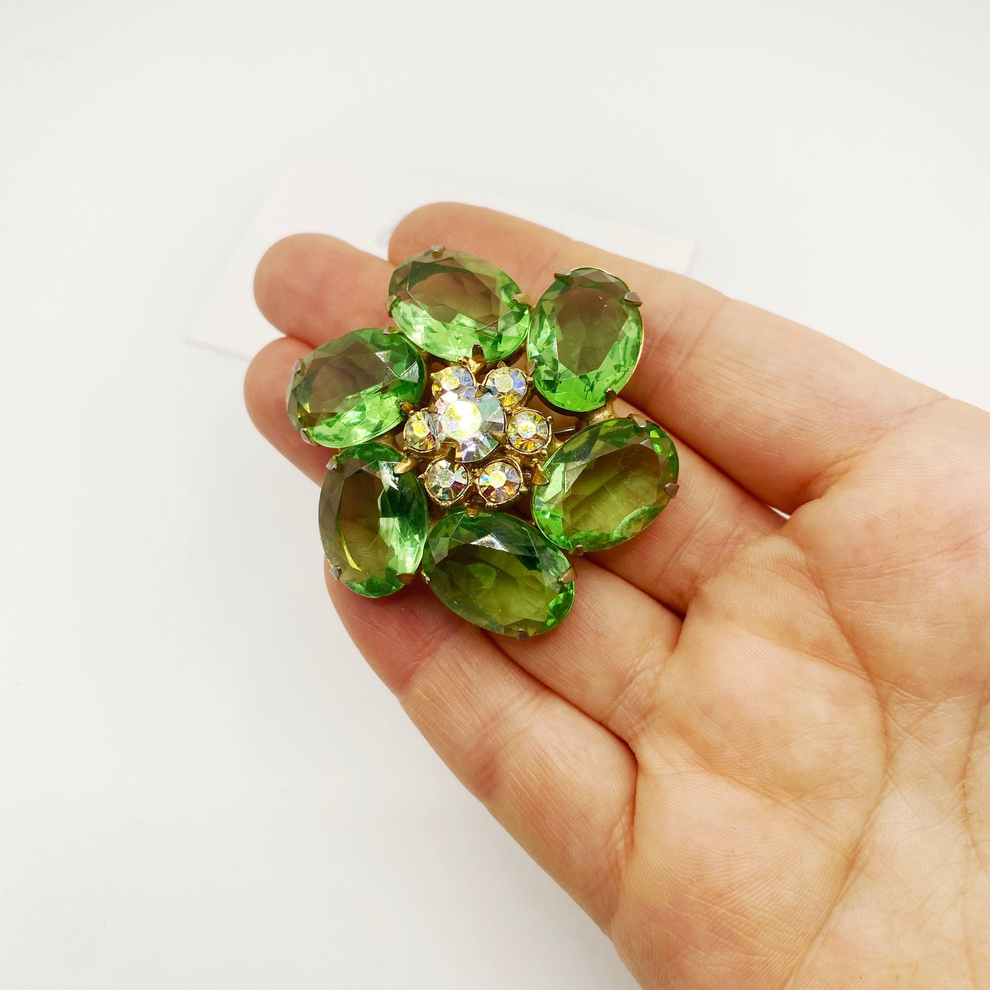Elegant mid-century brooch, Juliana D&E design with radiant green and AB crystals. 
