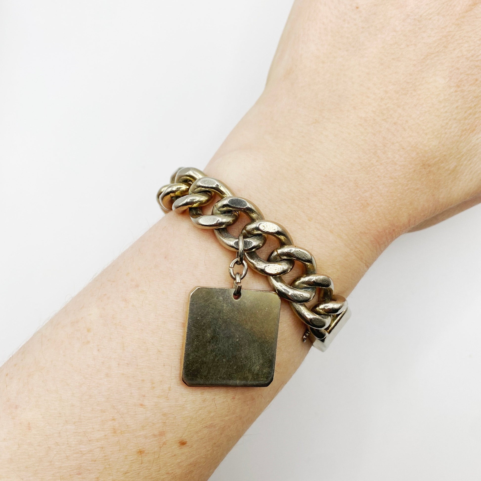 Wrist shot of vintage Monet silver-plated bracelet