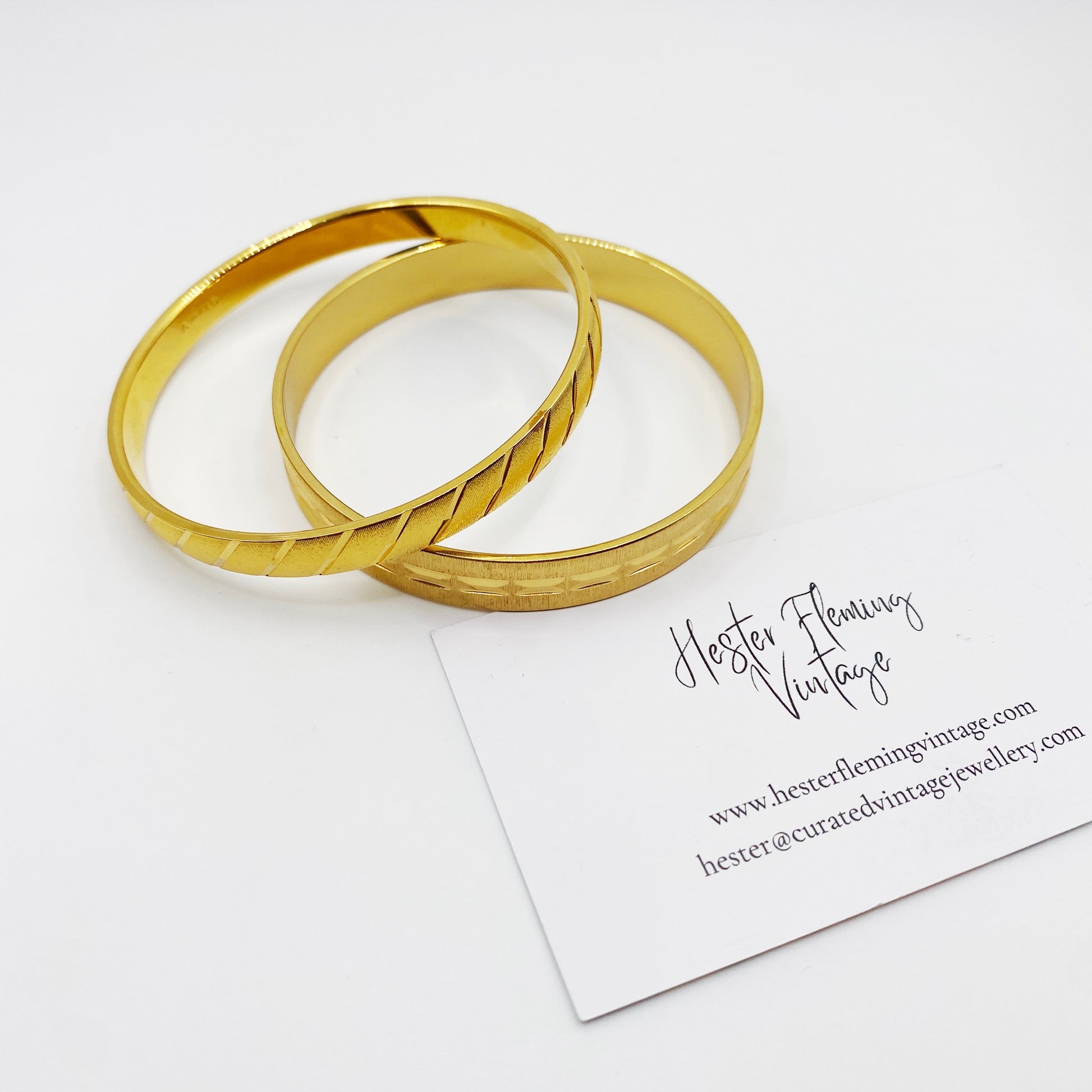 Pair of vintage 1960s Monet gold plated bangles from the Splendor Collection