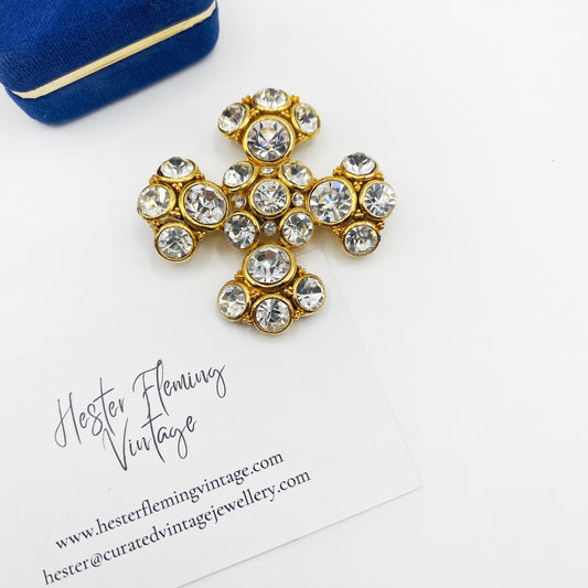 Vintage 1980s Maltese Cross brooch in 22kt gold plating with clear Swarovski crystals.