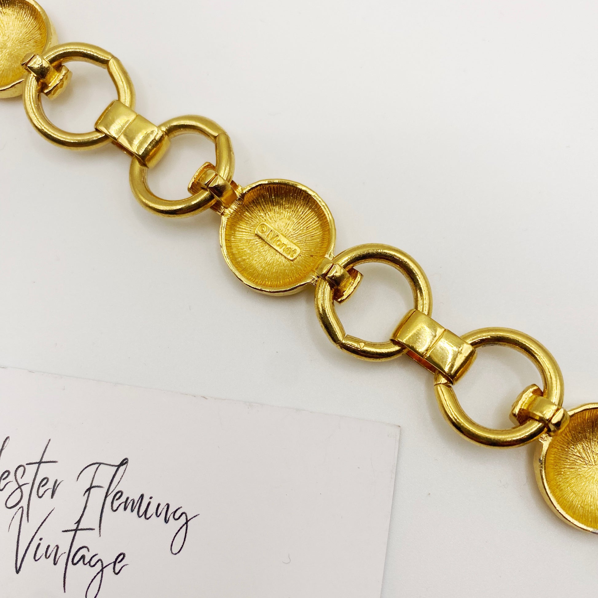 Detailed shot of gold-plated links on Monet 1980s designer bracelet