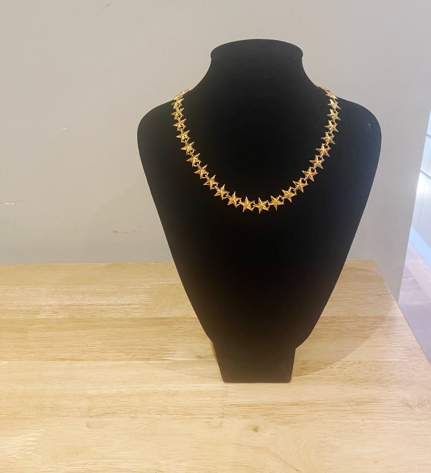 Vintage 1990s Anne Klein gold star necklace with gilt finish