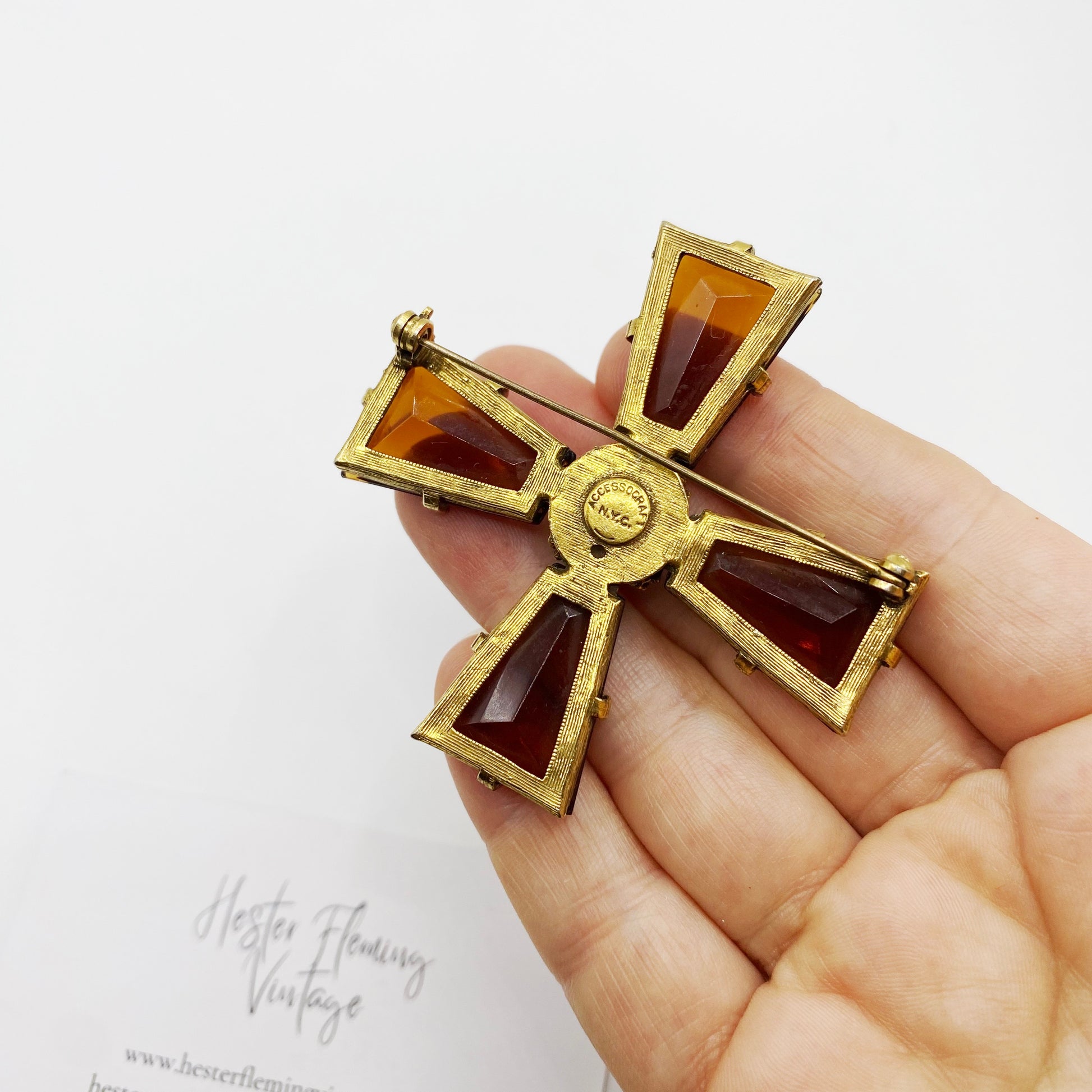 Back of signed Accessocraft NYC Maltese Cross brooch showing maker’s mark