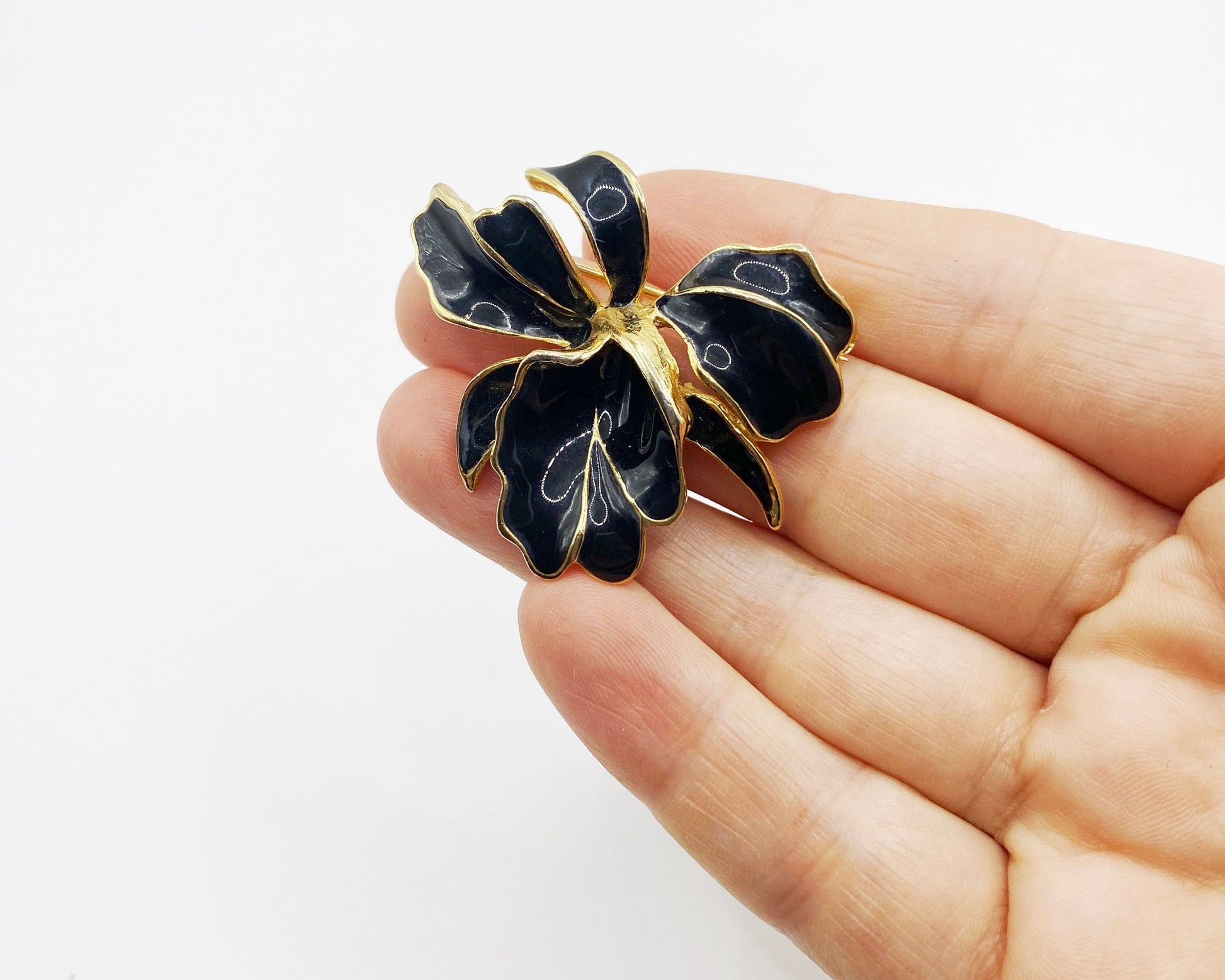 Collectible BARCS floral brooch with 22kt gold plating from the 1980s