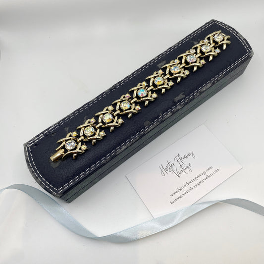 Vintage 1960s Coro bracelet with Aurora Borealis crystals and goldtone setting.