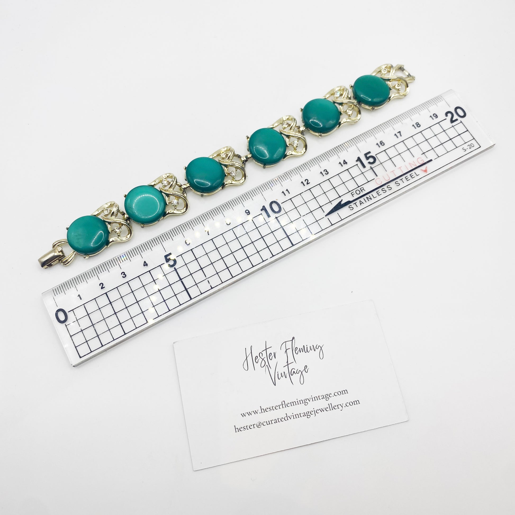 Vintage Coro bracelet with turquoise stones shown with ruler for scale