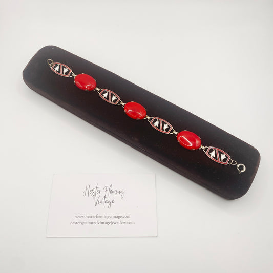 Vintage Czech red glass Art Deco bracelet from the 1930s/40s, silver setting with enamel detail