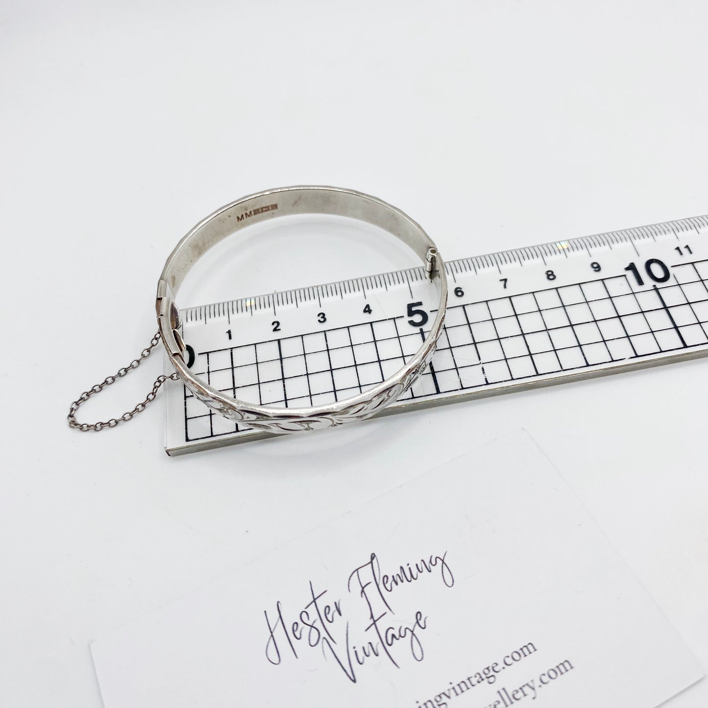 Measurement view of vintage engraved silver bangle bracelet