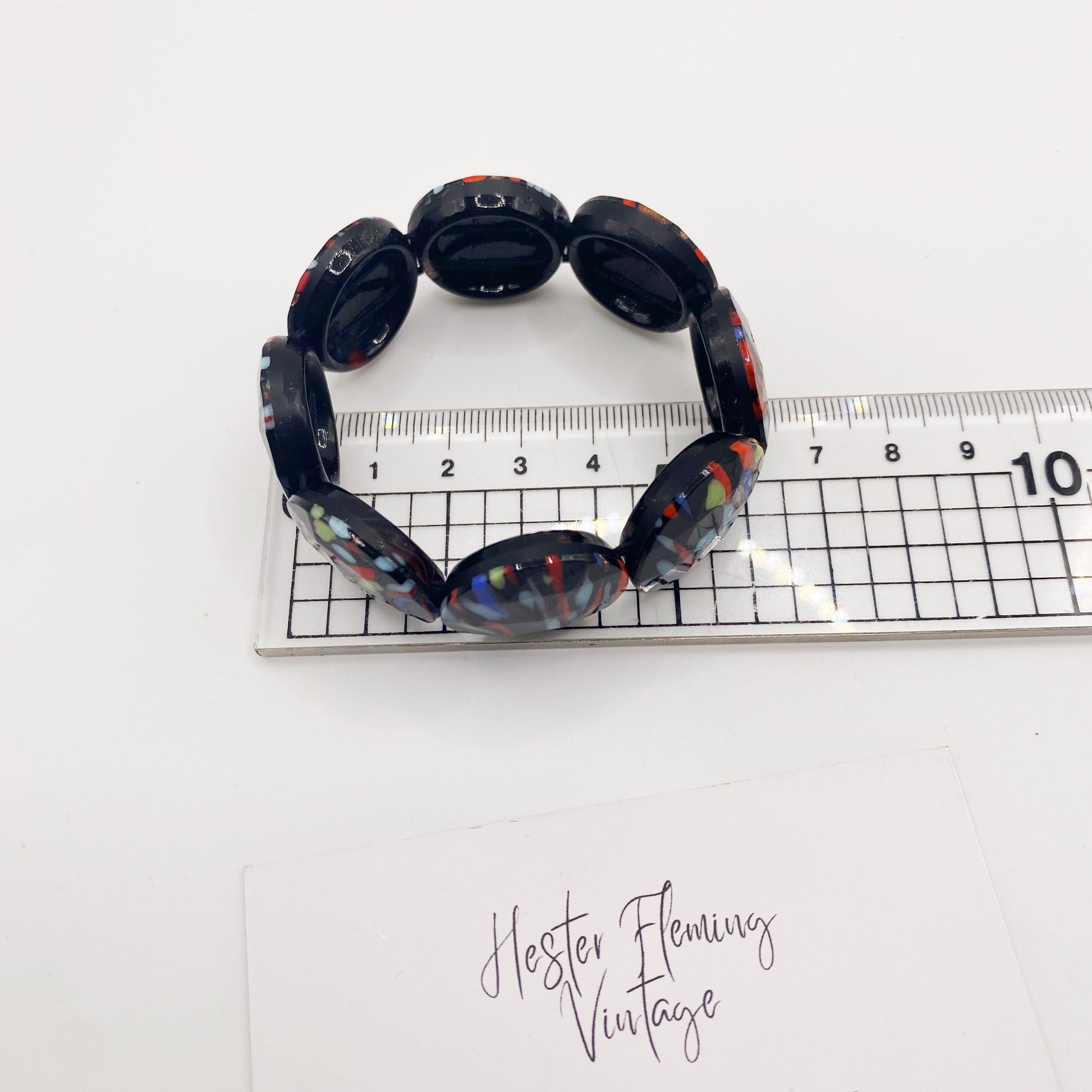 Measurement of 1970s French jet black glass bracelet.