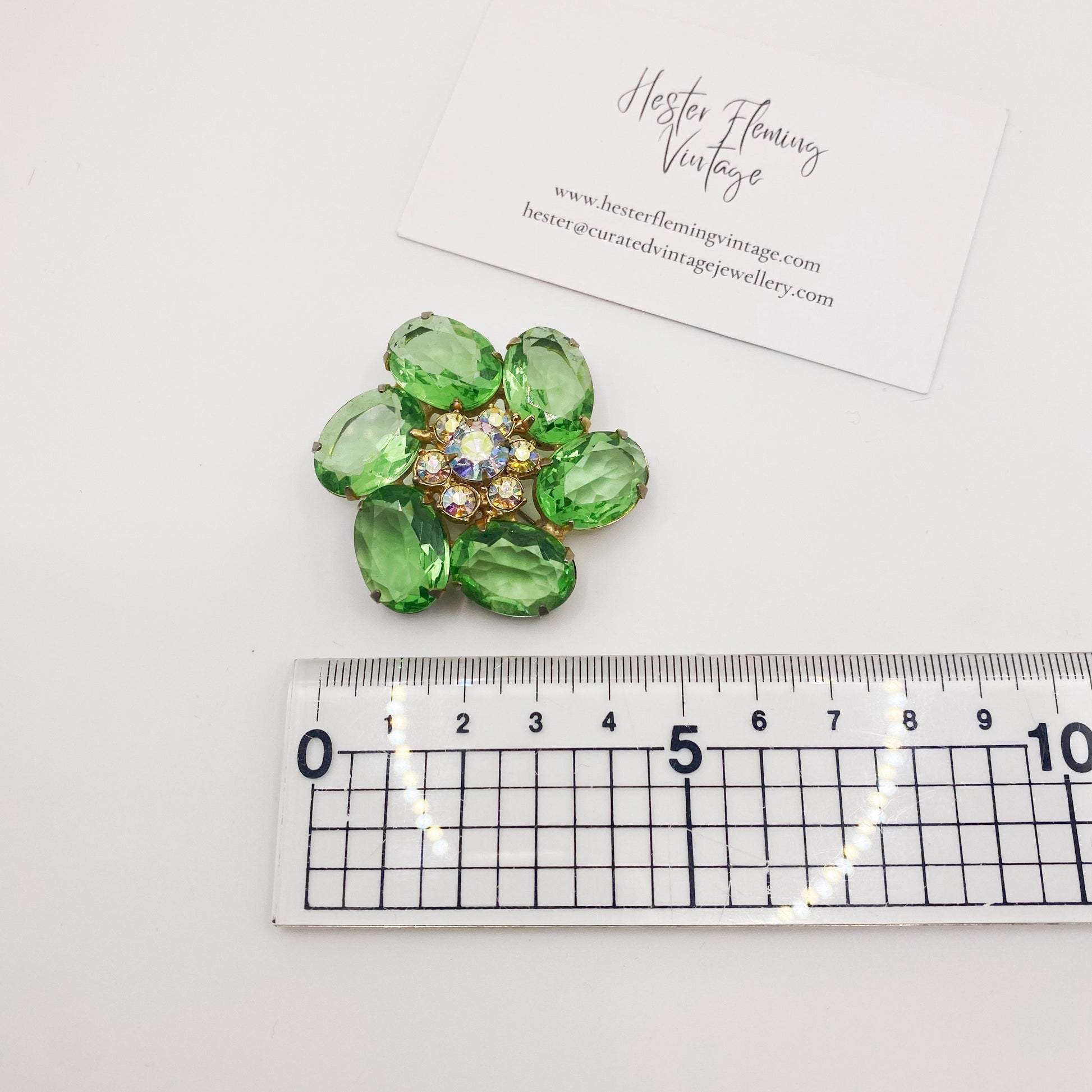 Mid-century sparkling AB crystal brooch, goldtone finish, 4.5 cm x 4.5 cm.