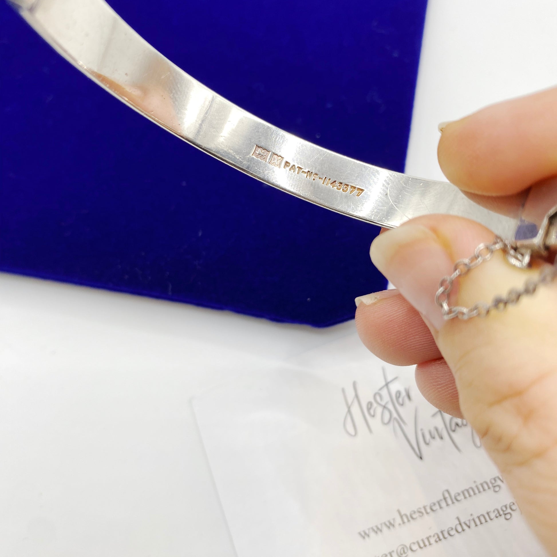 Interior hallmark on vintage sterling silver bangle with patent number